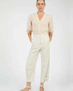 Cotton and linen blend trousers with visible buttons.